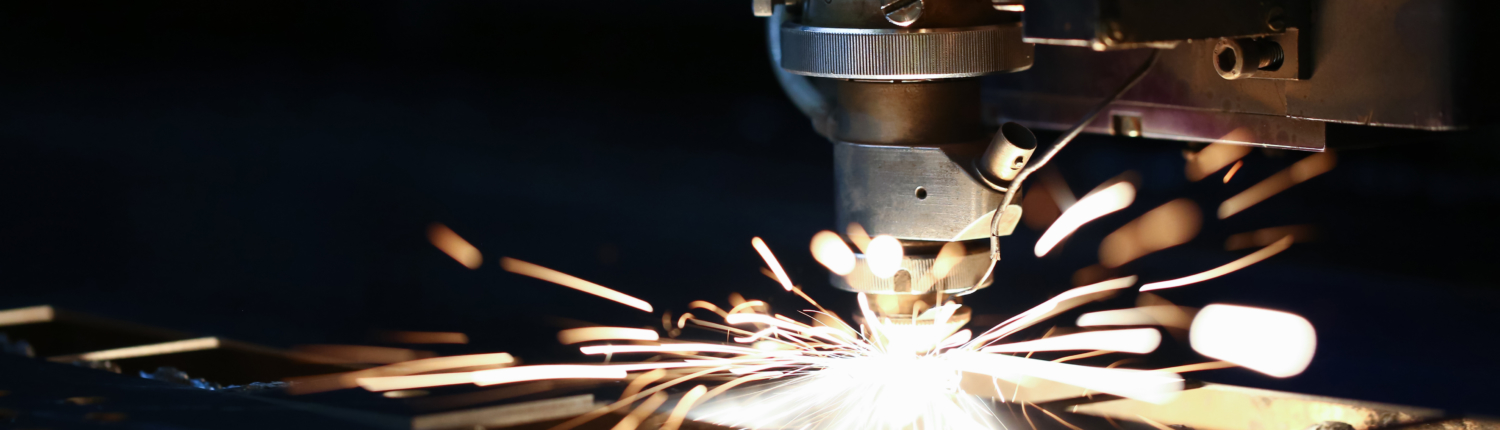 Sparks fly out machine head for metal processing